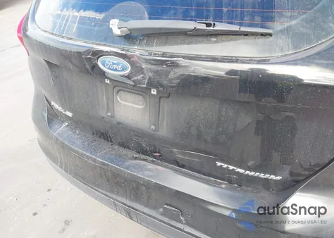 2017 Ford Focus Titanium z USA, uszkodzony, nr VIN 1FADP3N25HL256014